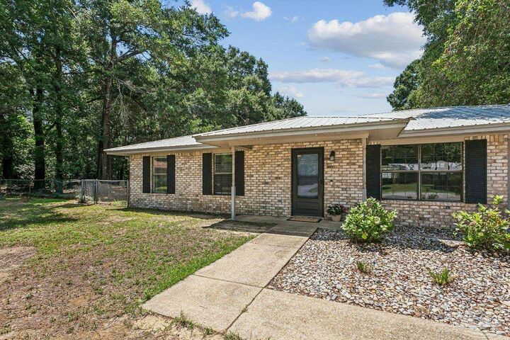 Property Photo:  5389 Camille Gardens Cir  FL 32570 