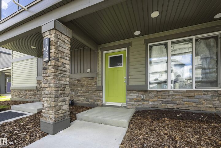Property Photo: 1530 Tamarack Boulevard NW 102 AB T6T 2E6
