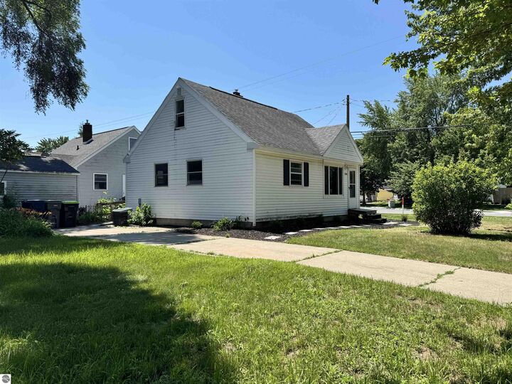 Property Photo:  104 Bradley  MI 48640 