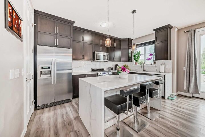 Property Photo: 1068 Windhaven Close SW AB T4B 0T9