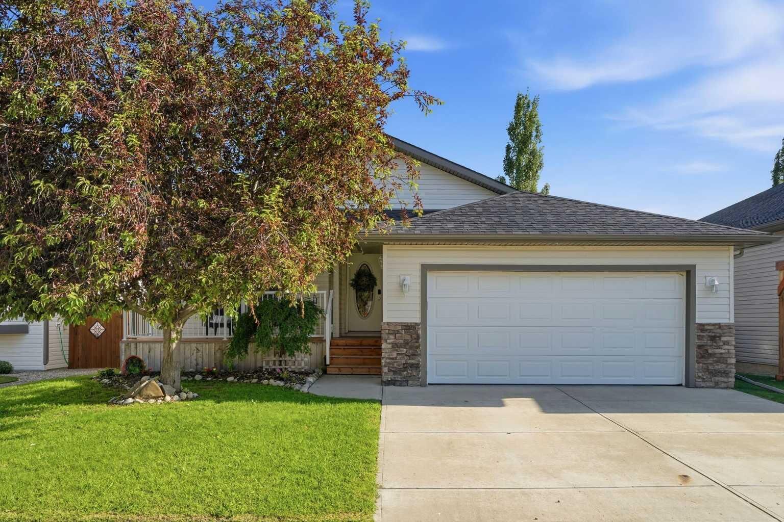 Property Photo: 412 Highland Close AB T1P 1X3