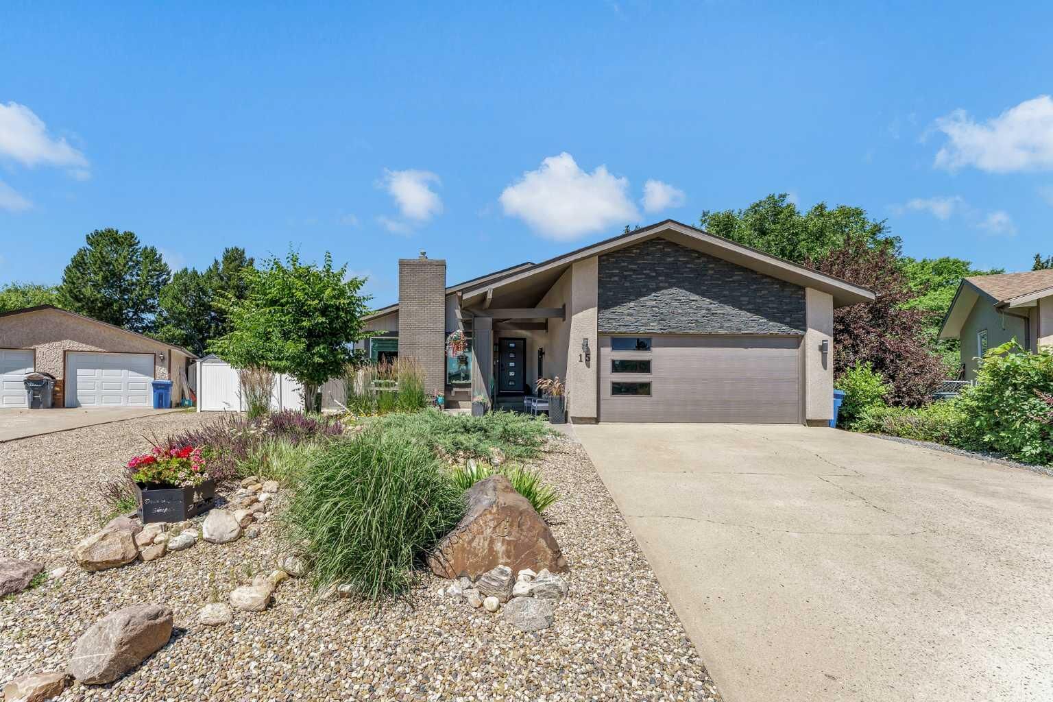 Property Photo:  15 Rossdale Way SE  AB T1B 1X5 