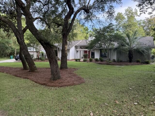 Property Photo: 103 E Capri Cove FL 32578