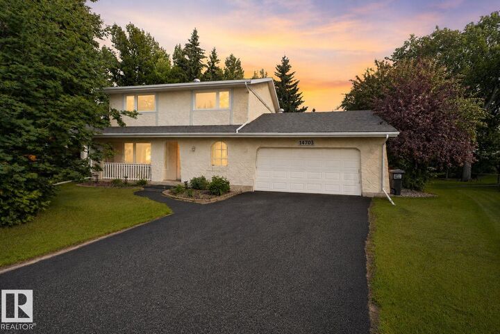 Property Photo:  14703 58 Ave NW  AB T6H 4T3 
