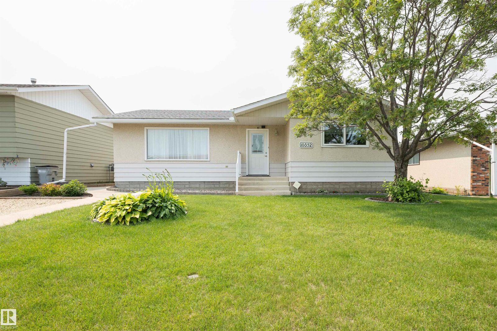 Property Photo:  10352 109 Ave  AB T7P 1G9 