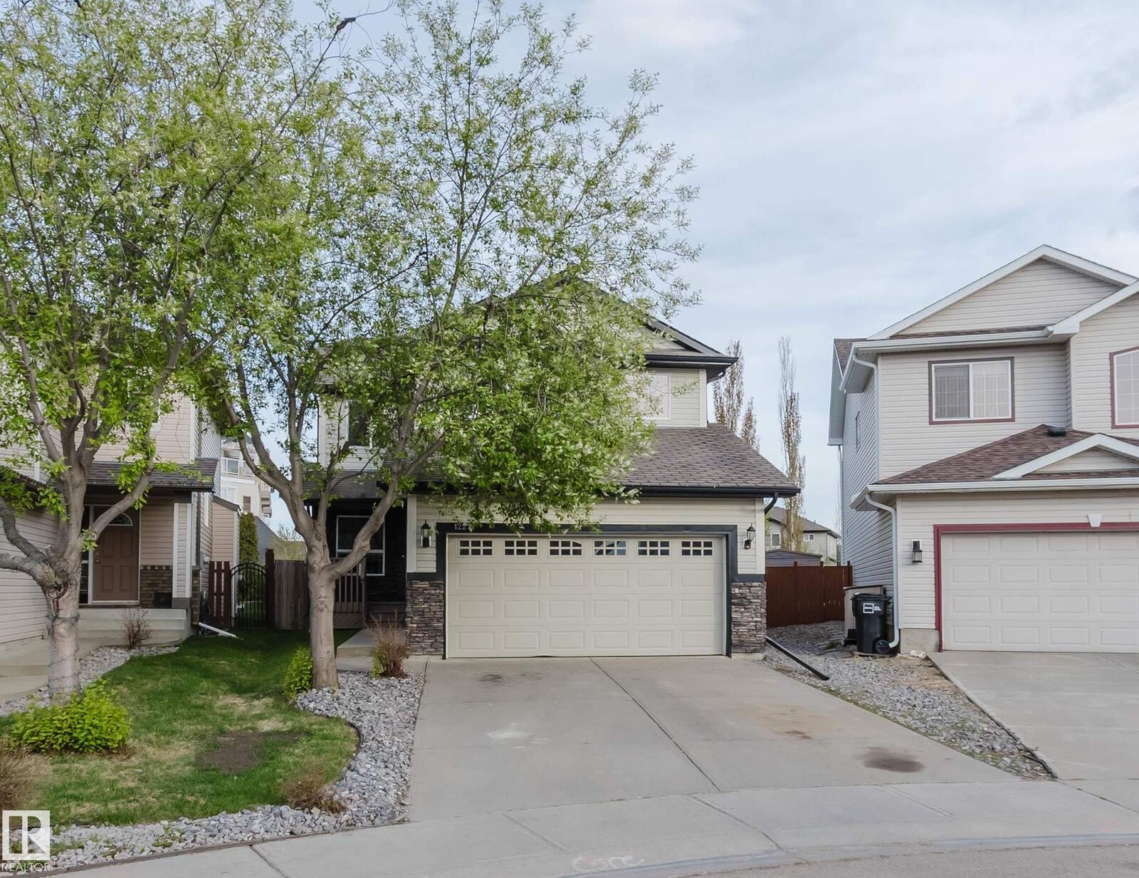 Property Photo: 1227 115 Street SW AB T6W 1W6