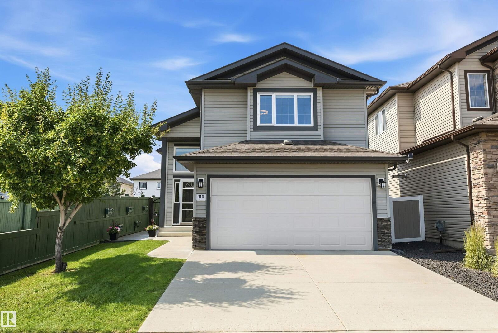 Property Photo: 114 Woodhill Lane AB T8L 0L8