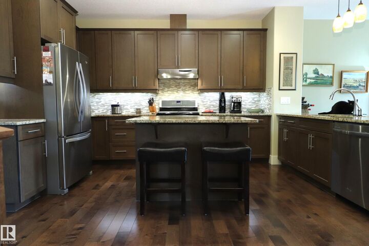 Property Photo:  7492 May Common NW  AB T6R 0G9 