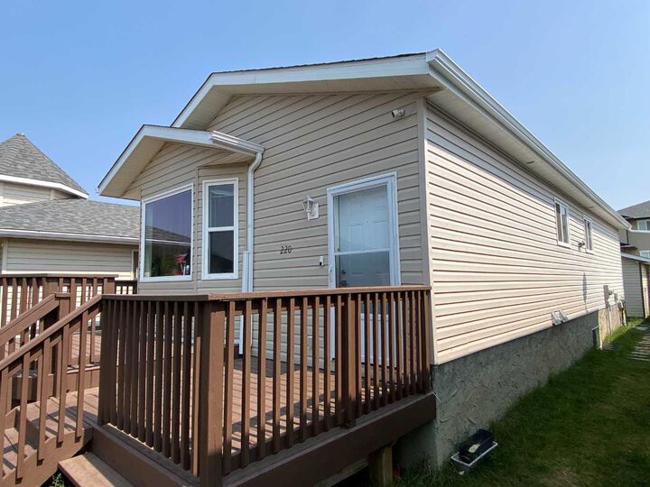 Property Photo: 220 16 Street E AB T1R 1K3