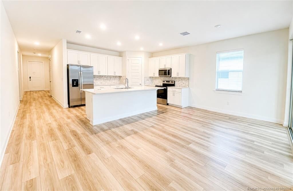 Property Photo:  8666 Dahlia Circle  FL 34986 