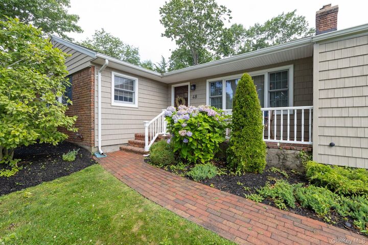 Property Photo:  48 William Penn Drive  NY 11790 