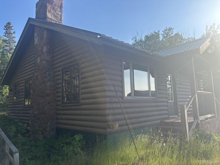 Property Photo:  13290 M-26 Highway  MI 49950 