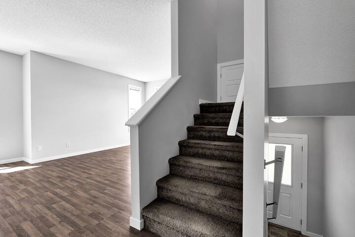 Property Photo: 130 New Brighton Way SE 124 AB T2Z 1H5