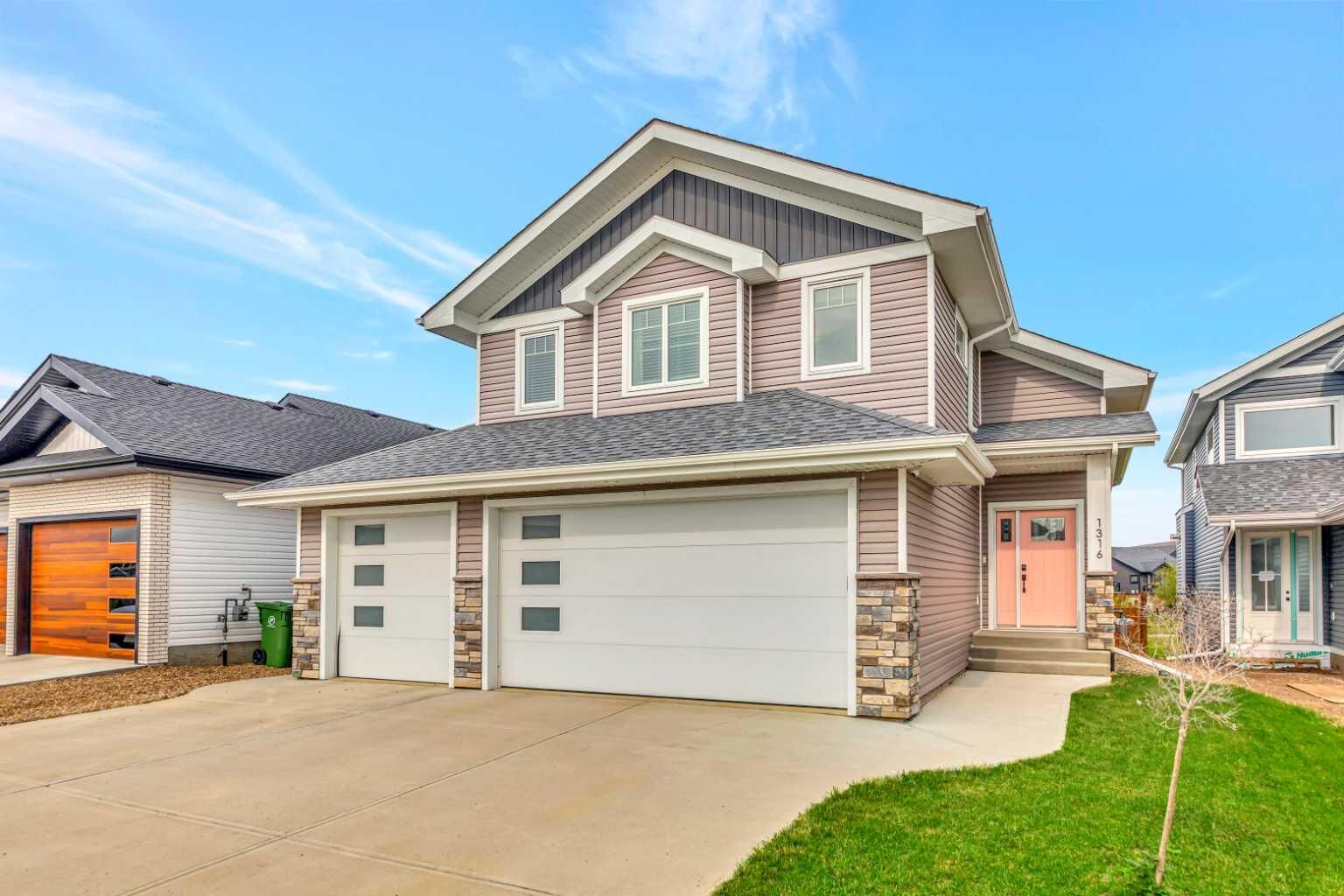 Property Photo: 1316 47 Avenue Close SK S9V 2K3