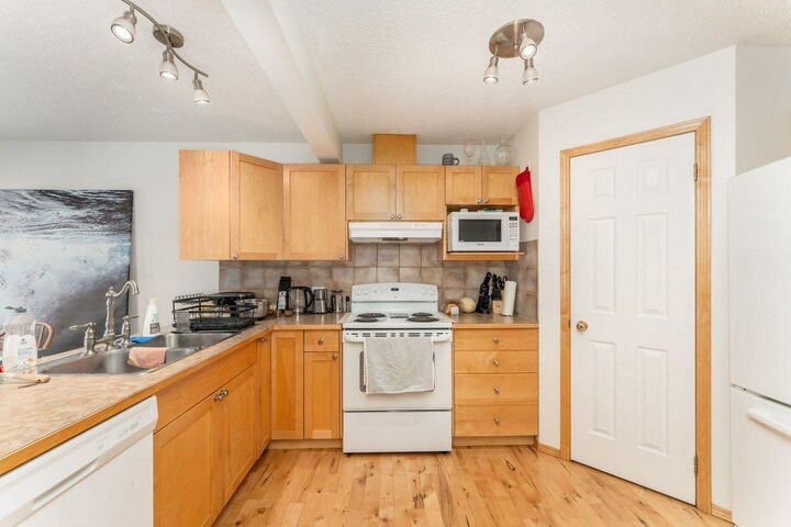 Property Photo: 809 Wilson Way 3 AB T1W 2Y8