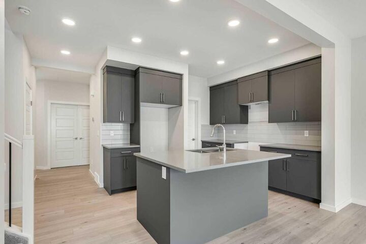 Property Photo: 408 Heartwood Grove SE AB T3M 2K1