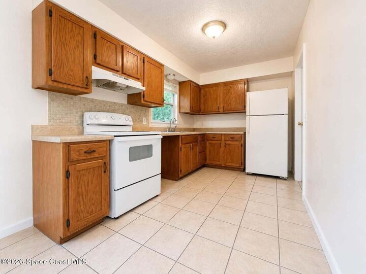 Property Photo:  2028 Rollins Drive SE  FL 32922 