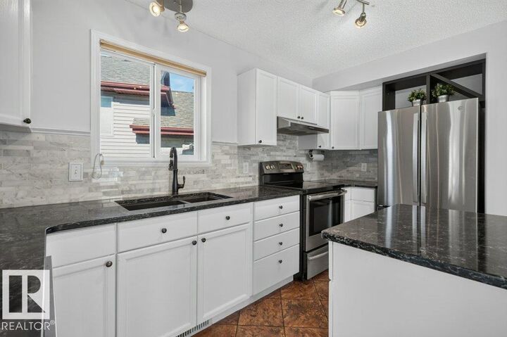 Property Photo:  438 Gibb Wynd NW  AB T5T 6W7 