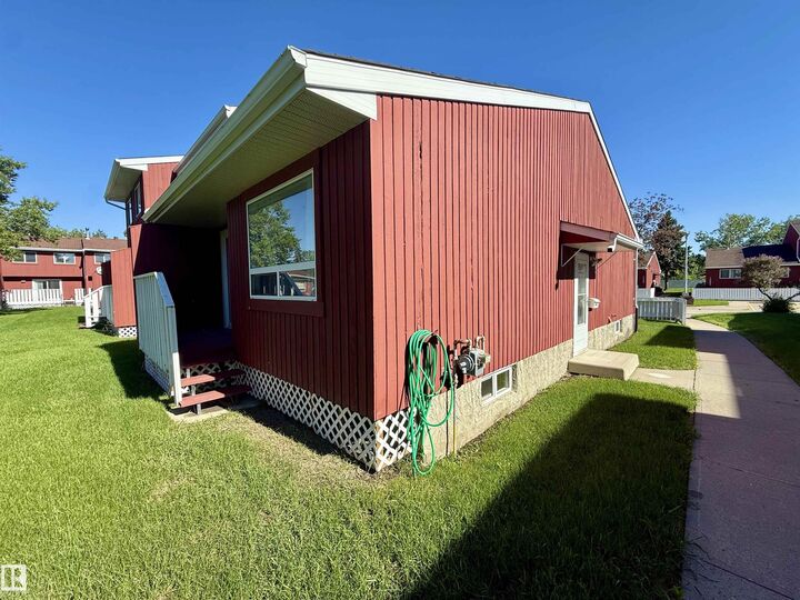 Property Photo: 10654 Beaumaris Road NW AB T5X 3N4