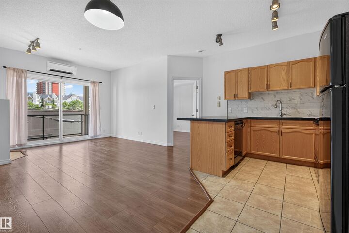 Property Photo:  10235 112 Street NW 209  AB T5K 1M7 