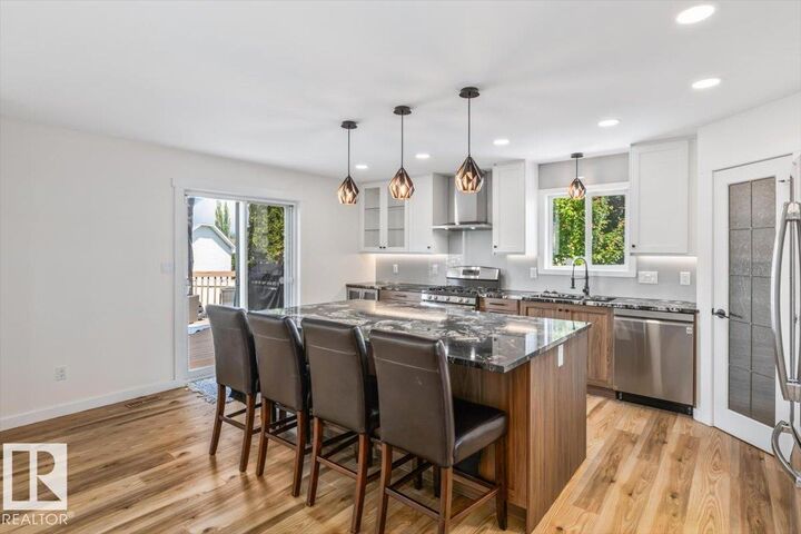 Property Photo: 661 Bevington Place NW AB T5T 6G6