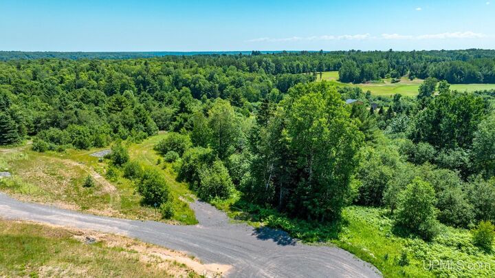 Property Photo:  Tbd Parcel M7 Applewood Drive  MI 49931 