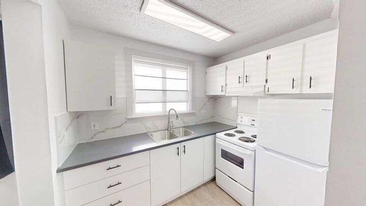 Property Photo:  9515 100 Avenue 101  AB T8V 0S8 