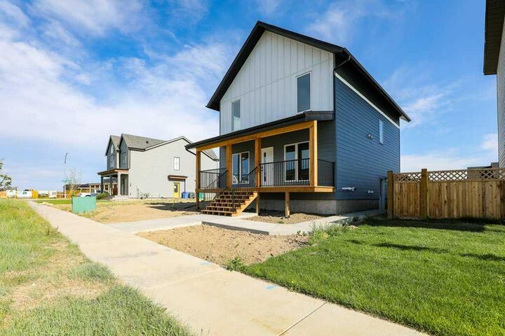 Property Photo: 411 Caledonia Boulevard W AB T1J 5W2