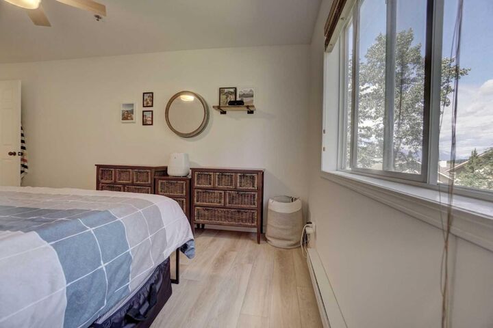 Property Photo: 1080C Cougar Creek Drive 209 AB T1W 2X9