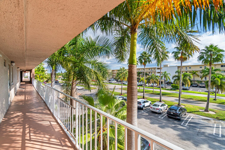Property Photo:  2615 NE 1st Court 406  FL 33435 