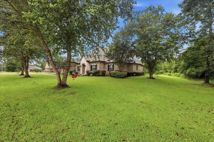 Property Photo: 12050 Woodland Drive TX 77705