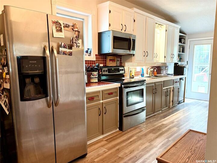 Property Photo: 67 Sixth Avenue N SK S3N 0X7