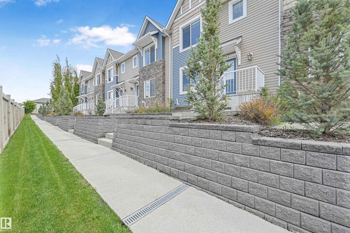 Property Photo: 2922 Maple Way NW 35 AB T6T 1A5