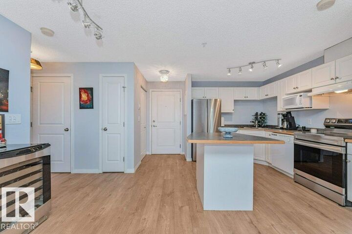 Property Photo:  245 Edwards Drive SW 217  AB T6X 1J9 