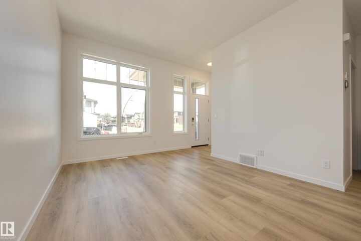 Property Photo:  21007 25 Avenue NW  AB T6M 2M7 
