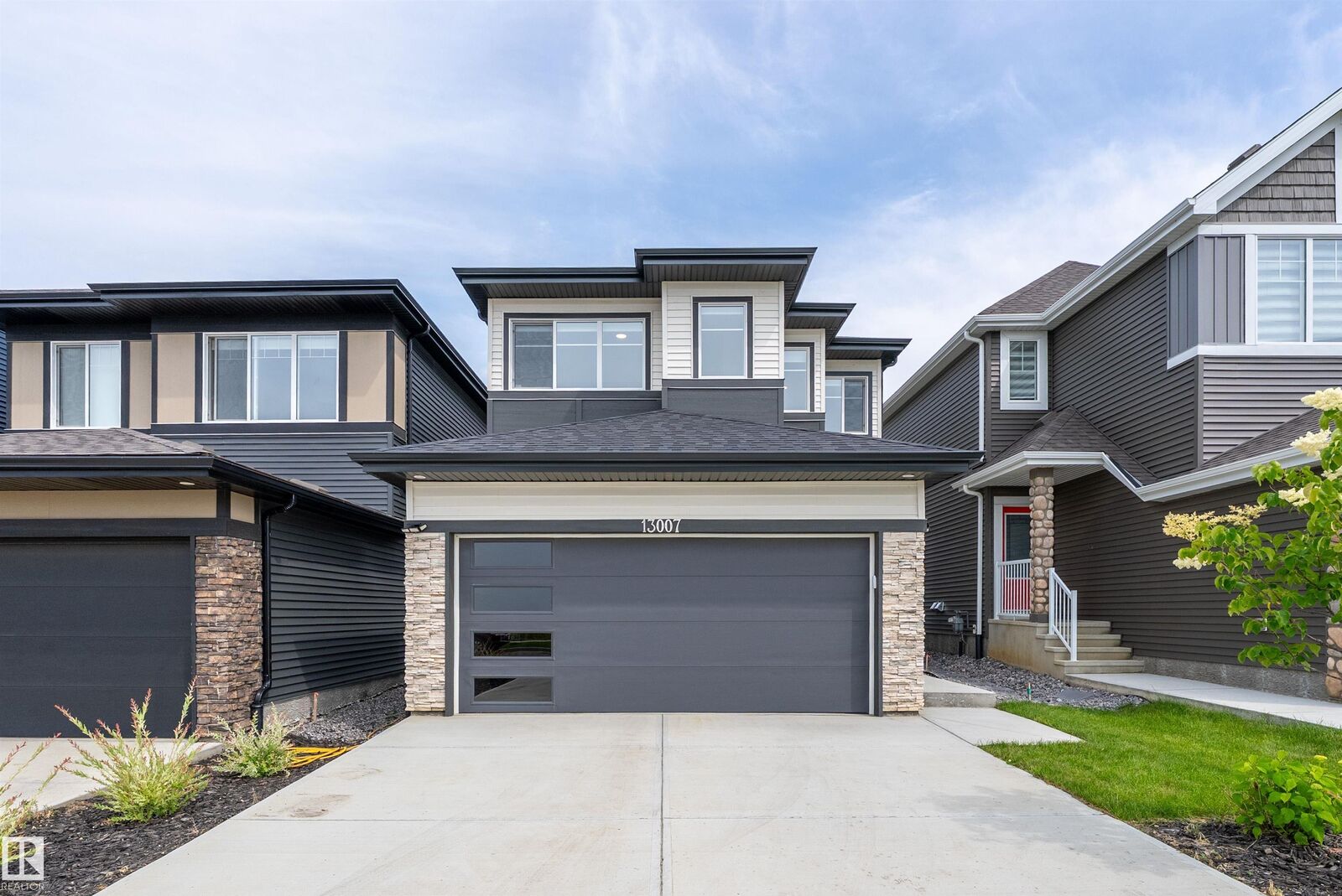 Property Photo:  13007 213 Street NW  AB T5S 0T7 
