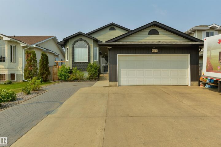 Property Photo: 417 Hollick-Kenyon Road NW AB T5Y 2T9