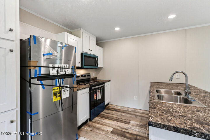 Property Photo:  7729 Narcissus Drive  MS 39553 