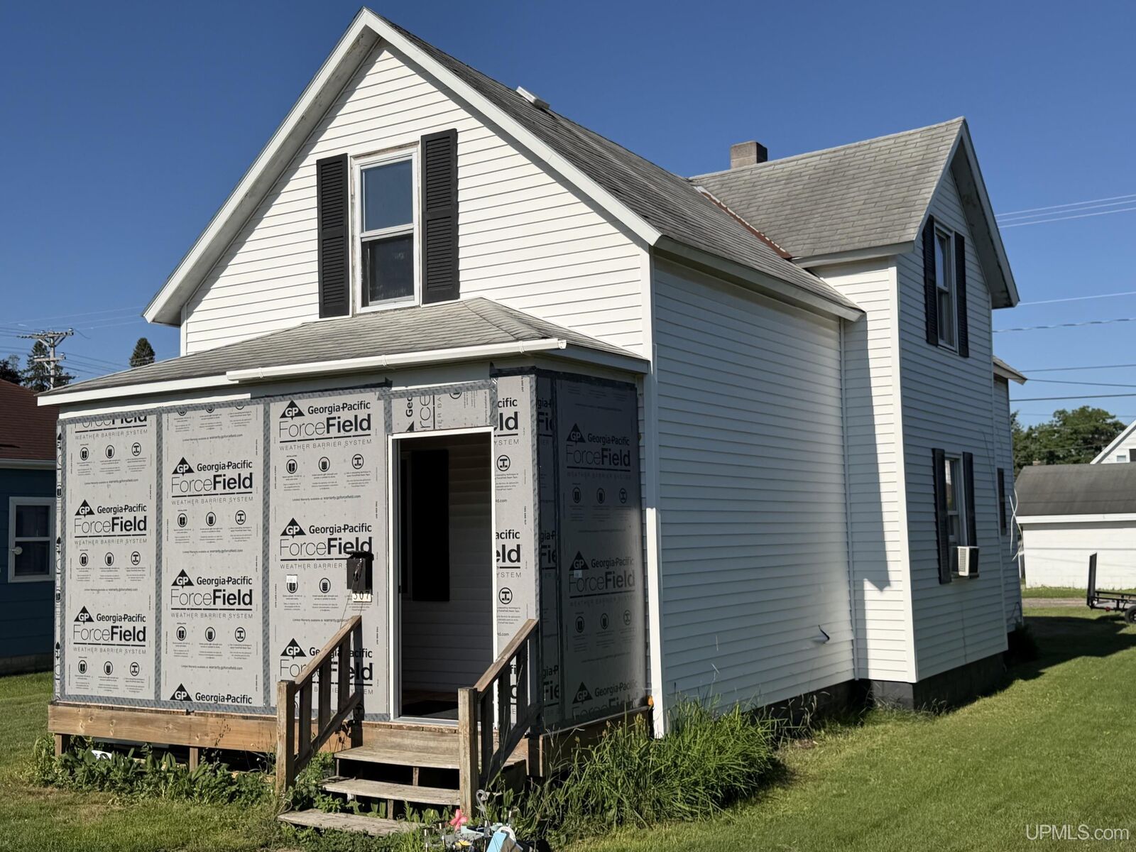 Property Photo:  307 Iron Street  MI 49870-1323 
