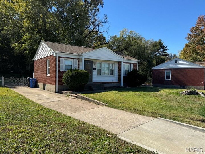 Property Photo:  840 Pershall Road  MO 63031 