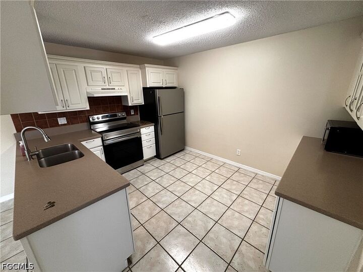 Property Photo:  5660 Foxlake Drive  FL 33917 