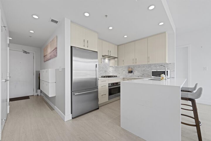 Property Photo: 518 Whiting Way 404 BC V3J 0H7