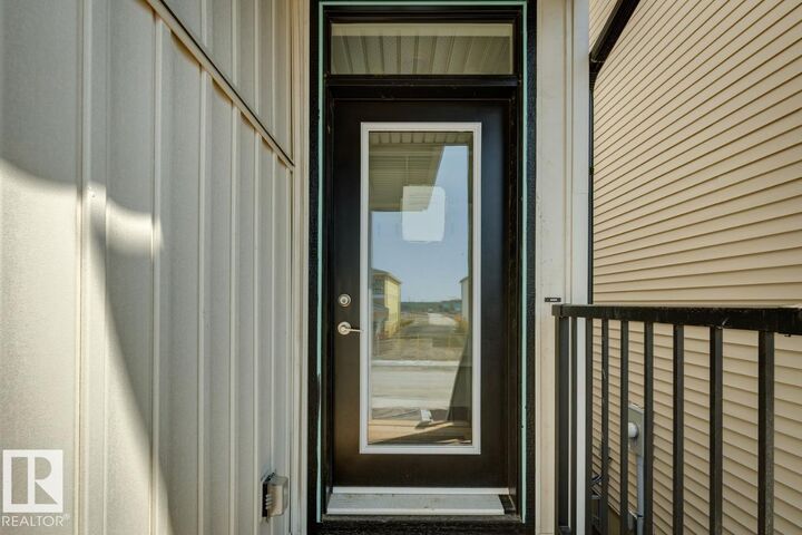 Property Photo:  7444 Klapstein Crescent SW  AB T6W 5N7 