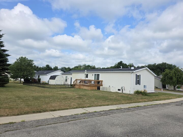 Property Photo: 1402 Westwind Lane MI 49412