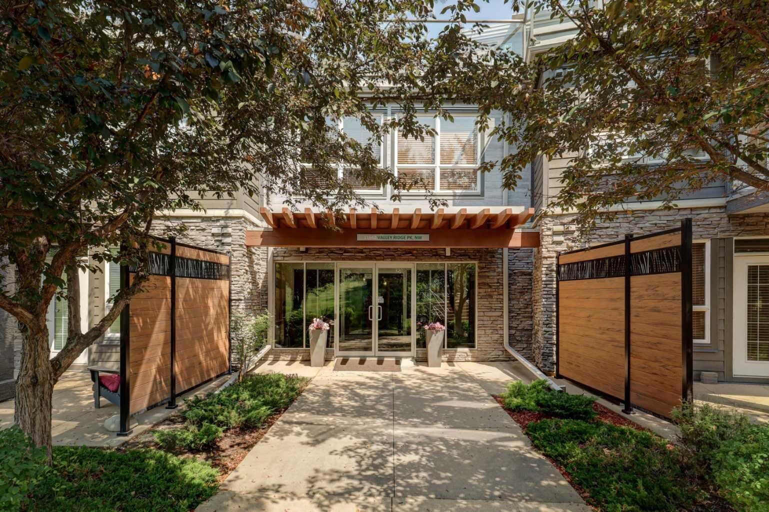 Property Photo: 11642 Valley Ridge Park NW 105 AB T3B 5Z5