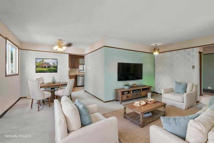 Property Photo:  6832 Huntchester Road NE  AB T2K 5E6 