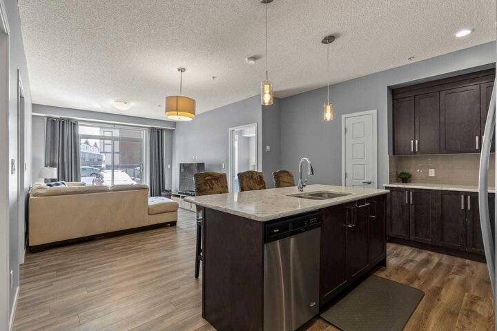 Property Photo: 6703 New Brighton Avenue SE 114 AB T2Z 5C8