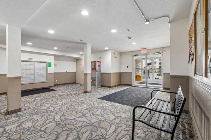 Property Photo: 304 Mackenzie Way SW 7207 AB T4B 3H7