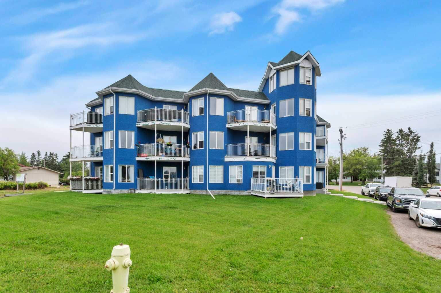Property Photo: 5135 Lakeshore Drive 312 AB T4S 1E2