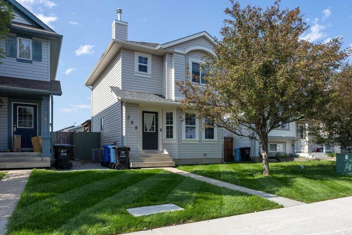 Property Photo: 369 Diefenbaker Drive AB T9K 2K3